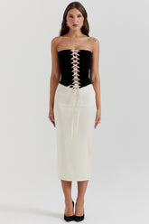 black & vintage cream strapless corset dress